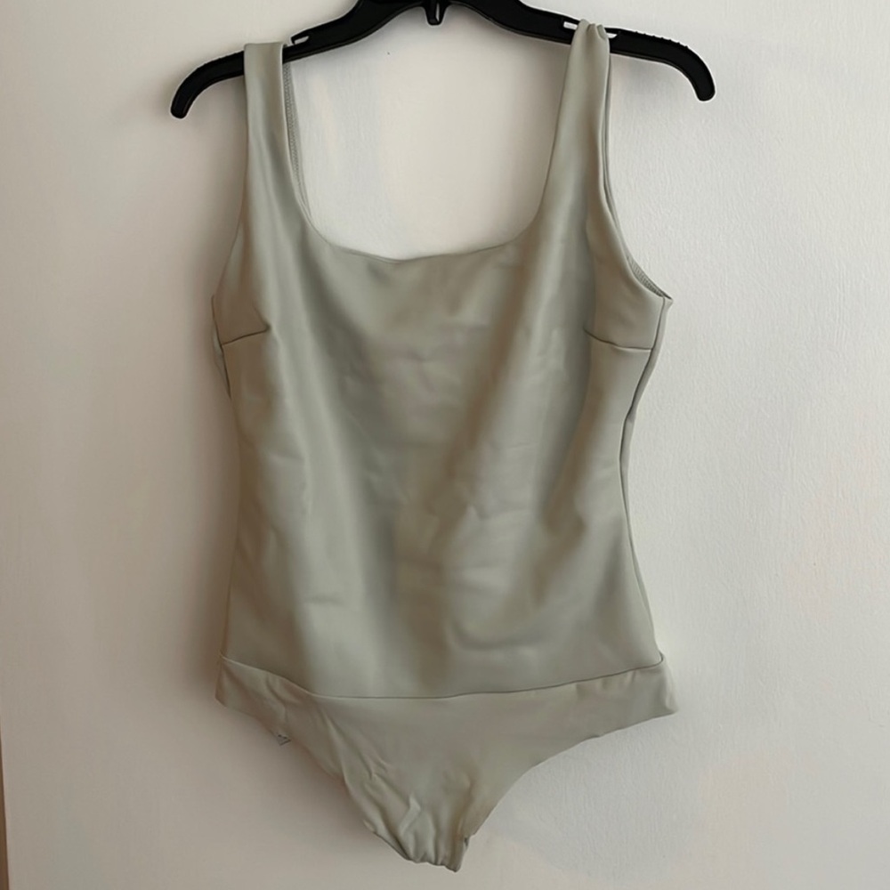 Skim’s leather bodysuit